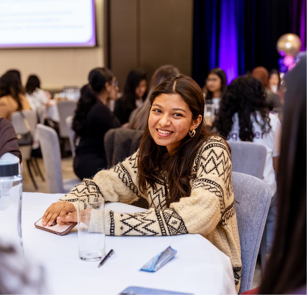 GEM mentor sitting at a table in a roundtable